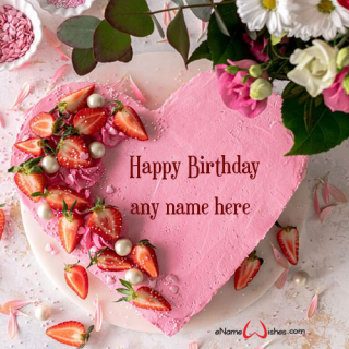 heart cake with strawberries on top with name